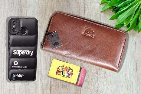 Women's Cowhide Leather Bifold Wallet with Zipper, showing daily essentials styling