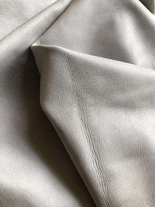 White Distressed Crazy Horse Sheepskin Leather Hide, showing supple drape and folds