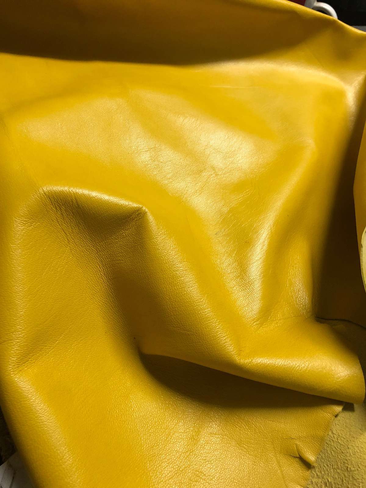 Yellow Nappa Sheepskin Leather Hide AA Grade, showing smooth texture and soft folds