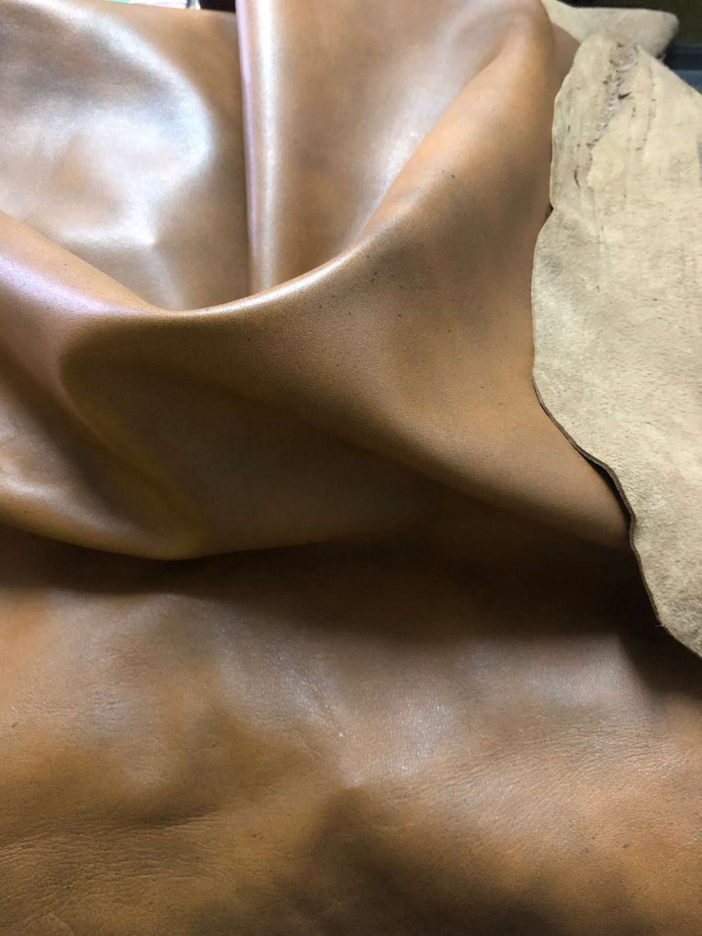 Tan Distressed Crazy Horse Sheepskin Leather Hide, showing pull-up effect texture close-up