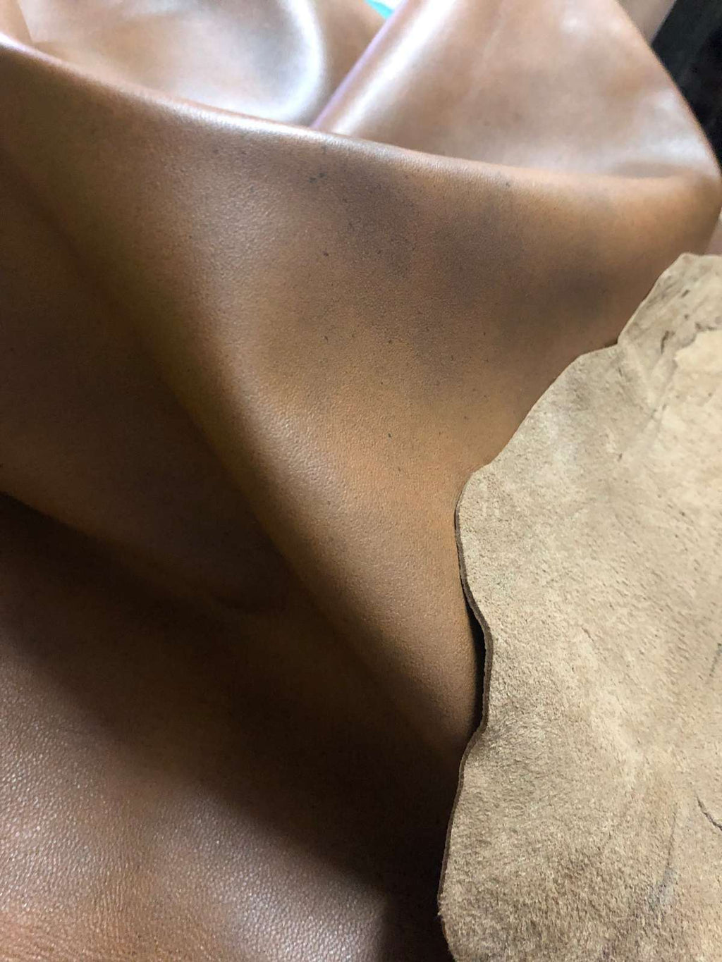 Tan Distressed Crazy Horse Sheepskin Leather Hide, showing natural grain color variation
