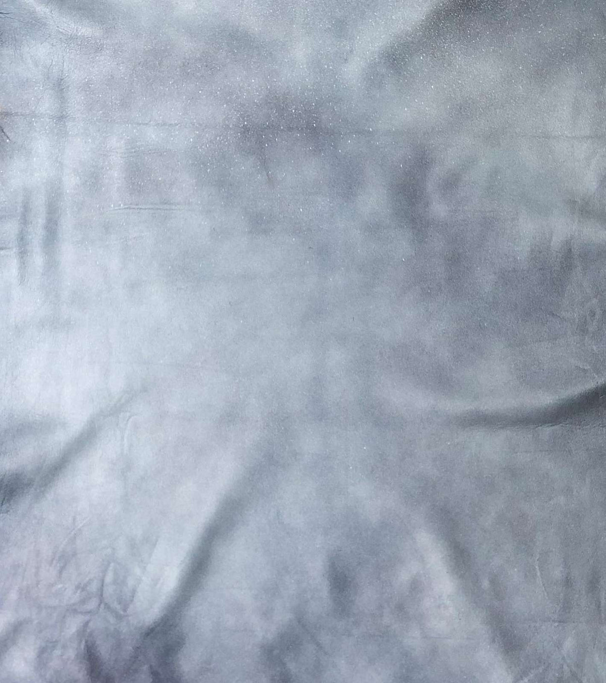 Blue Distressed Crazy Horse Sheepskin Leather Hide, showing pull-up grain texture close-up