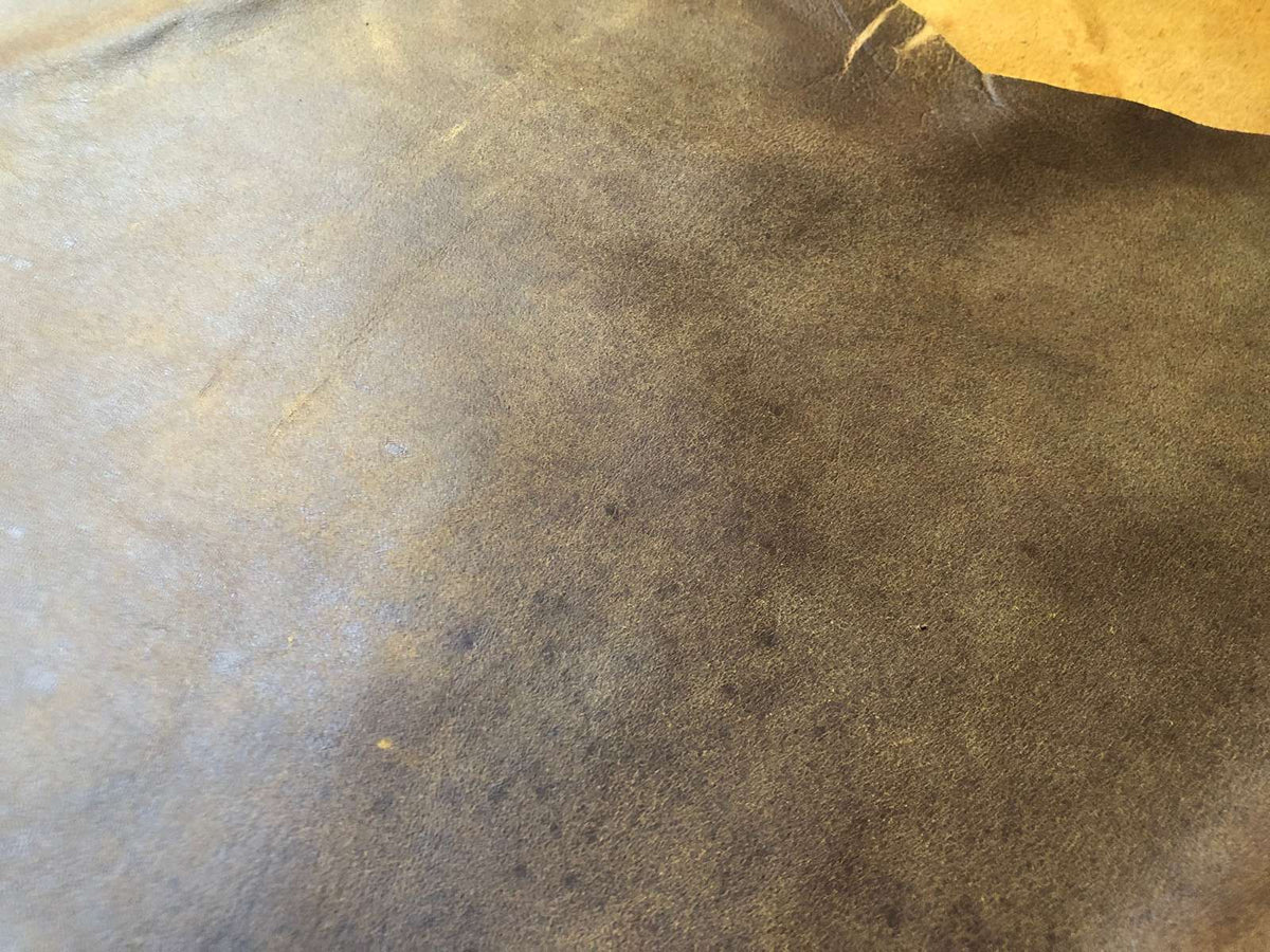 Antique Brown Nappa Sheepskin Leather Hide, showing vintage patina texture close-up