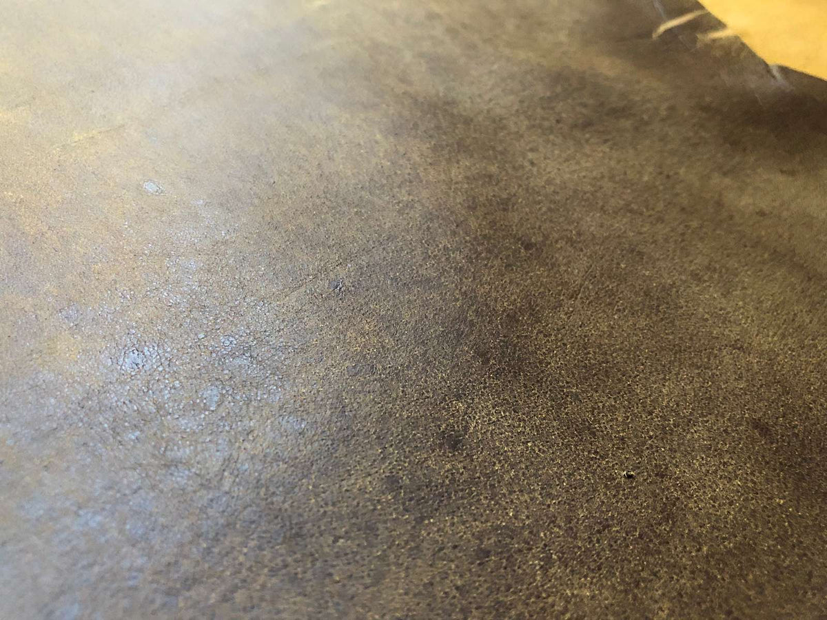 Antique Brown Nappa Sheepskin Leather Hide, showing grain and edge detail