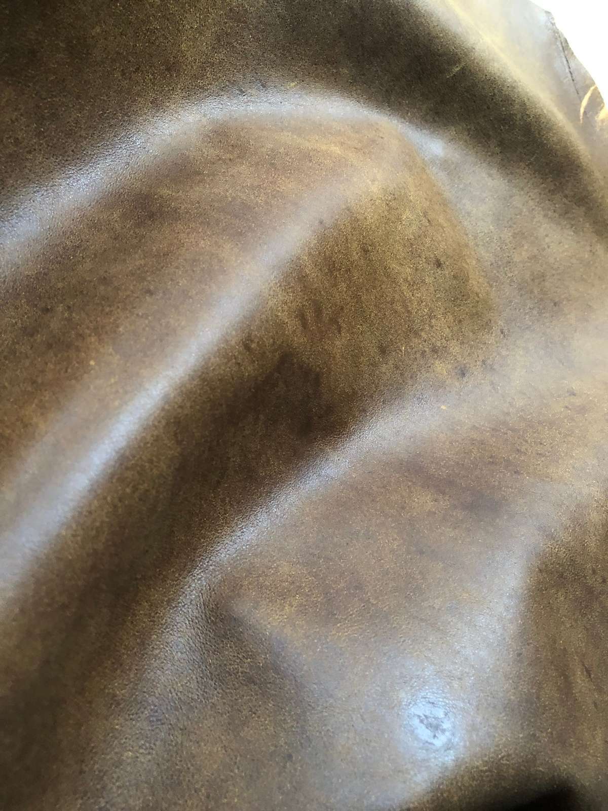 Antique Brown Nappa Sheepskin Leather Hide, showing soft drape and supple folds